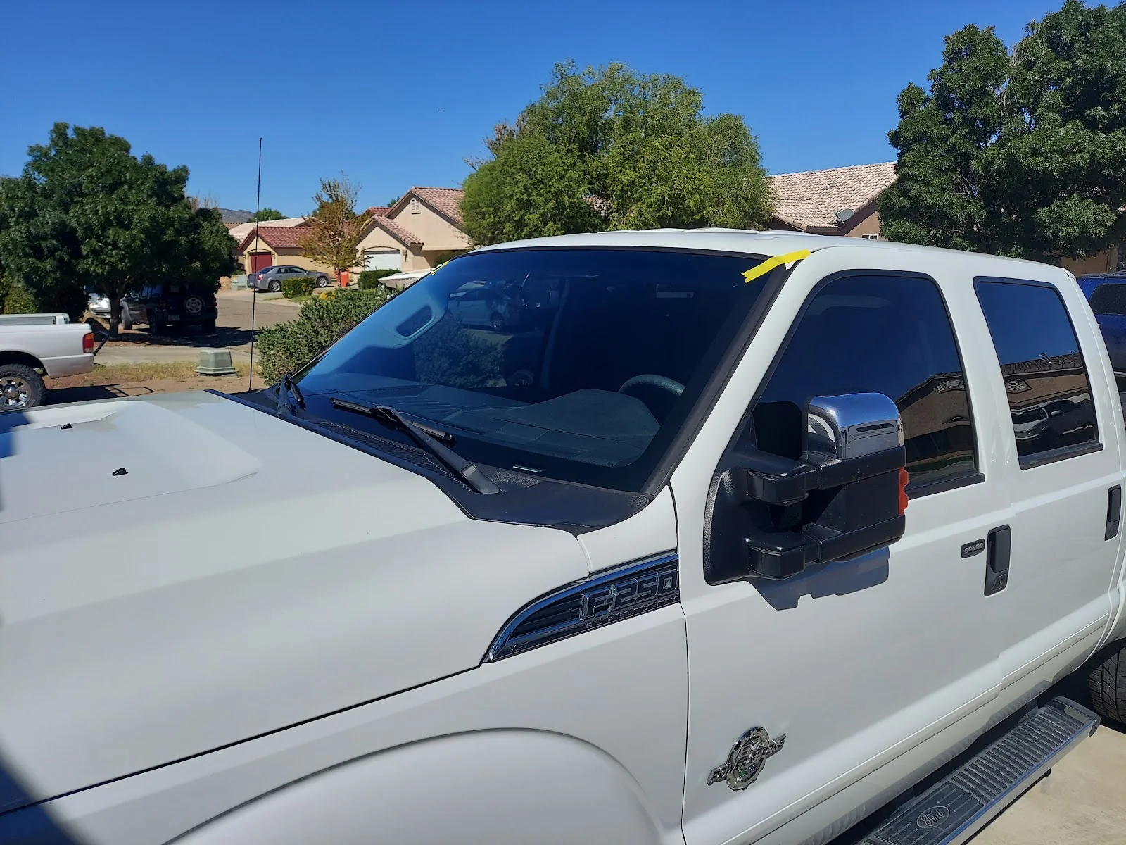 Fresh windshield install on a lifted F-250 in Kingman, AZ